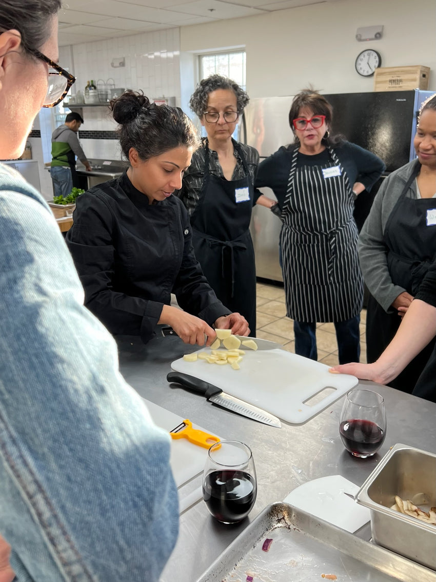 Dicing potatoes for our recipe and teaching the class necessary steps for North Indian Cooking by DHOL Spice Mix