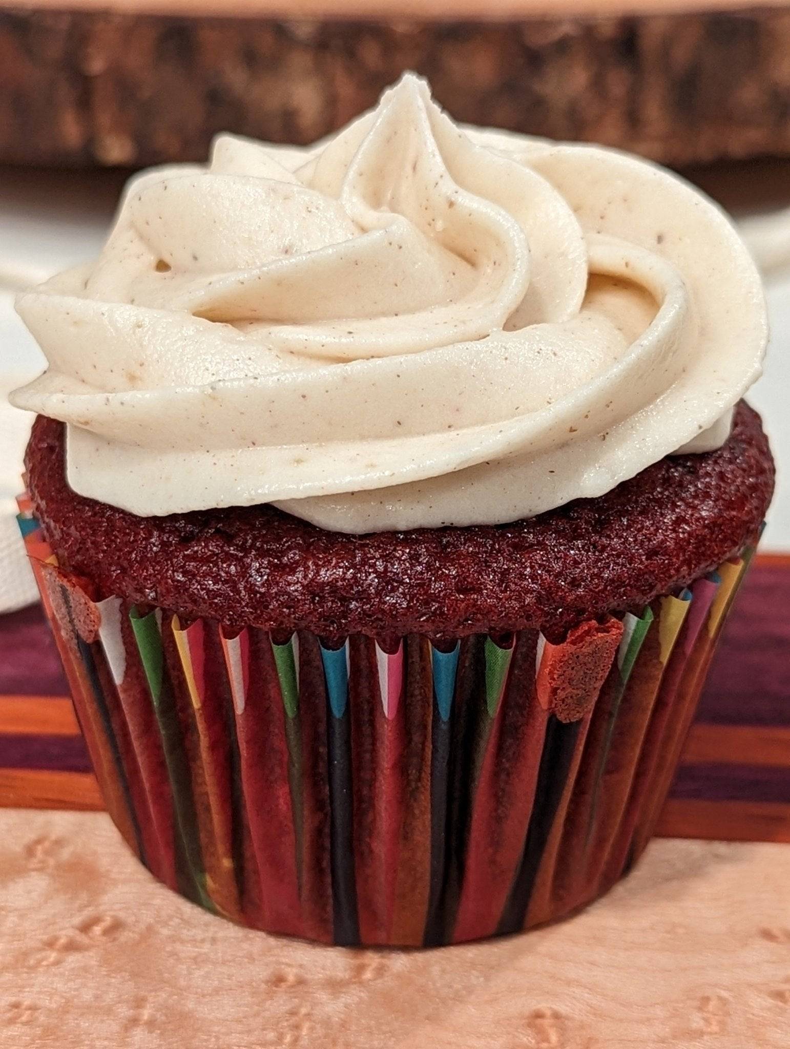 chai buttercream frosting on a red velvet cupcake made with DHOL Chai spice