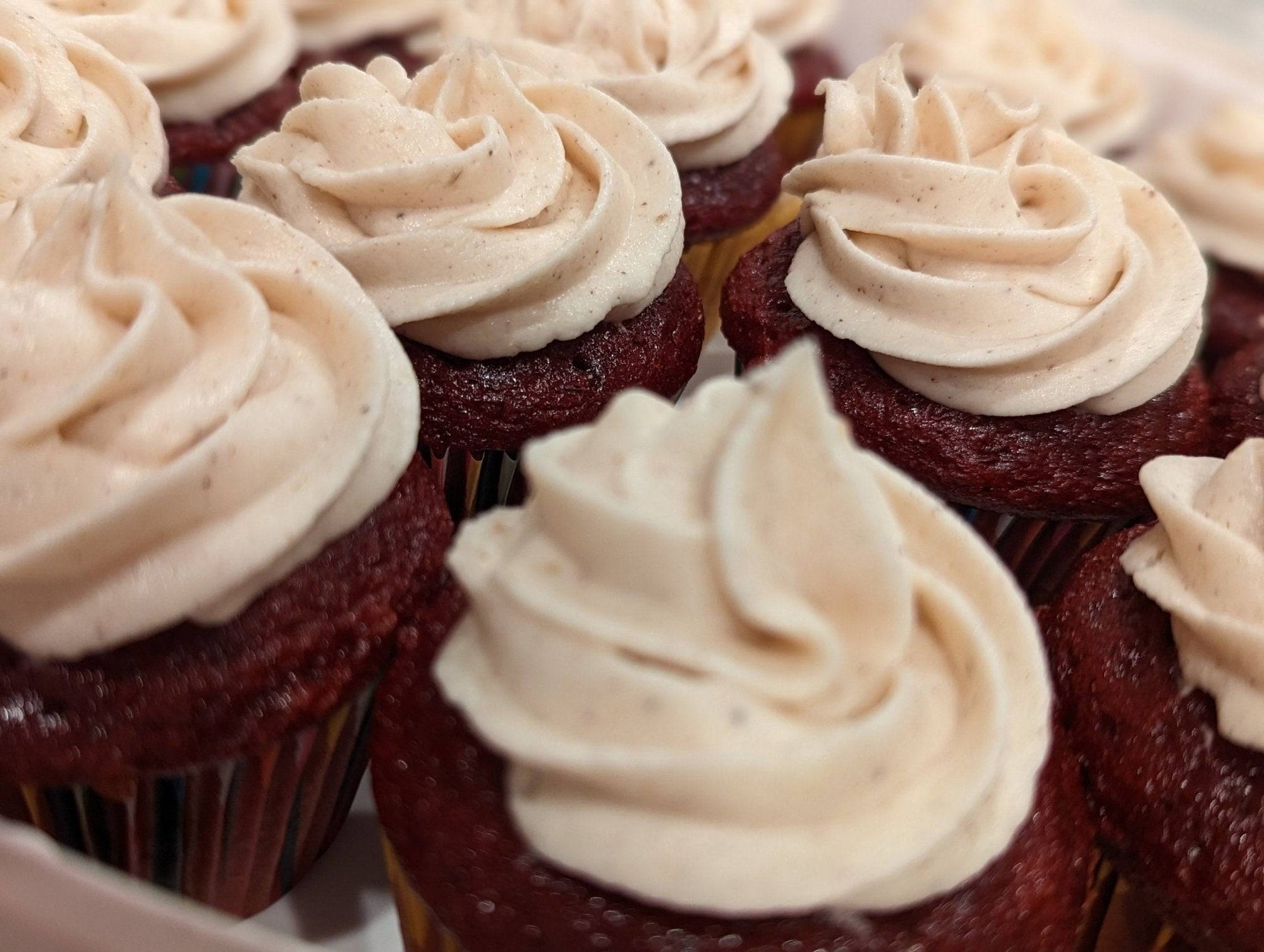 a bunch of cupcakes that are on a tray
