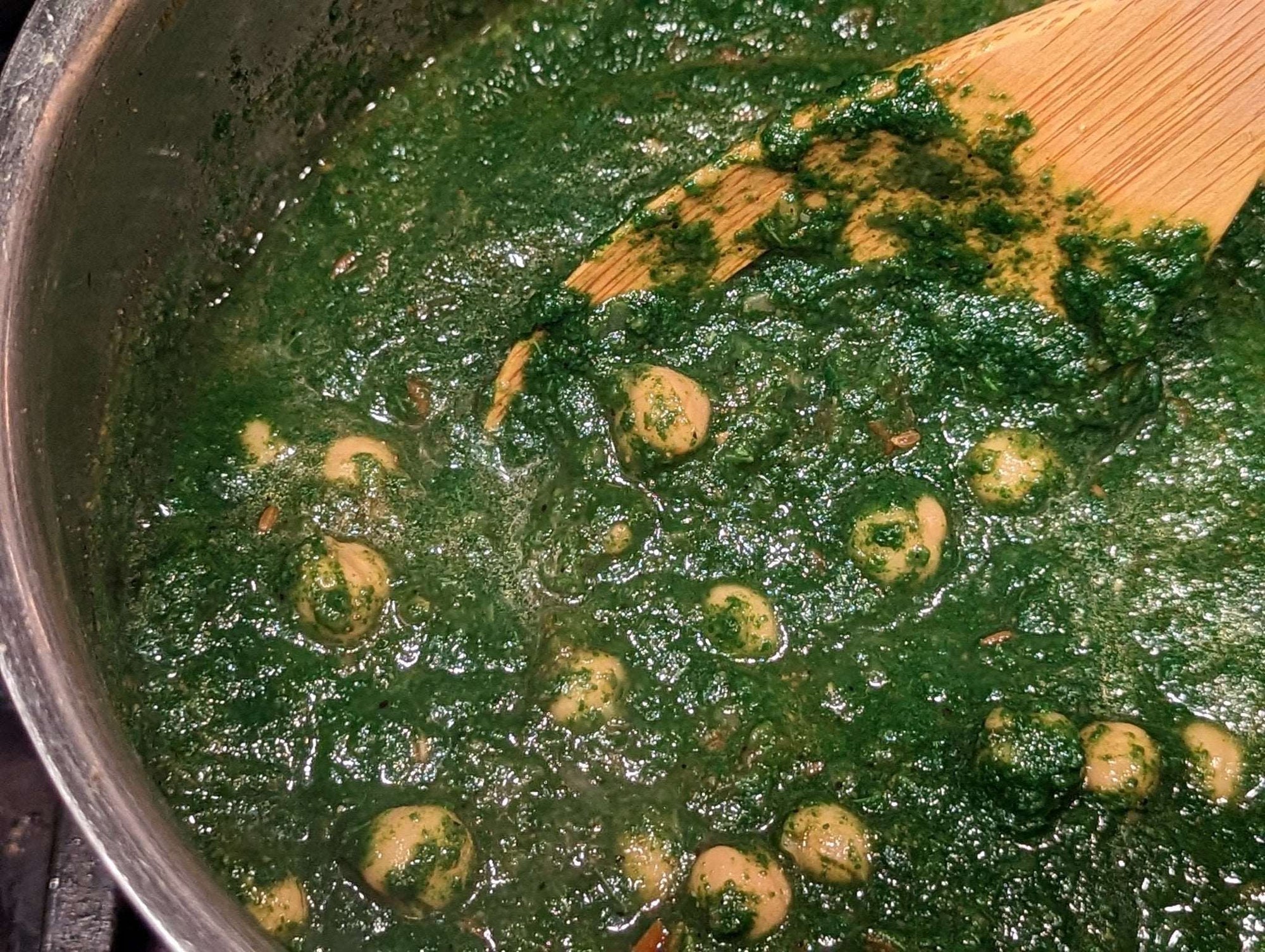 a pan filled with broccoli and other vegetables