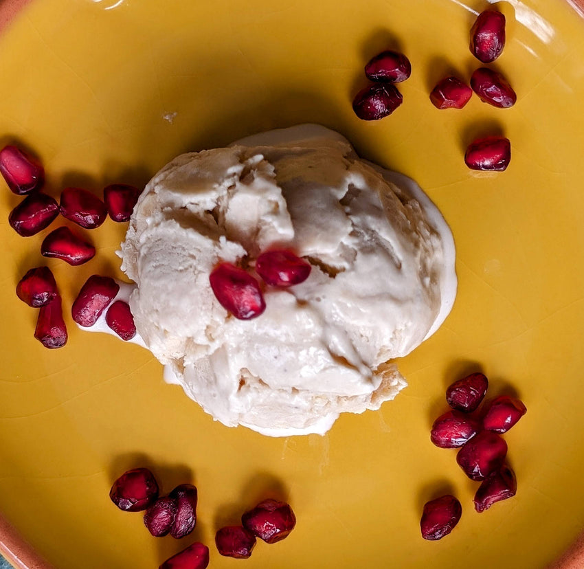 Creamy kulfi ice cream made with DHOL Chai Spice garnished with pomegranate by DHOL Spice Mix