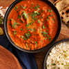 Rich and creamy buttery chicken curry served with fragrant basmati rice and freshly baked naan.