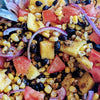 a tangy, spicy summer salad with DHOL Popcorn Spice mix