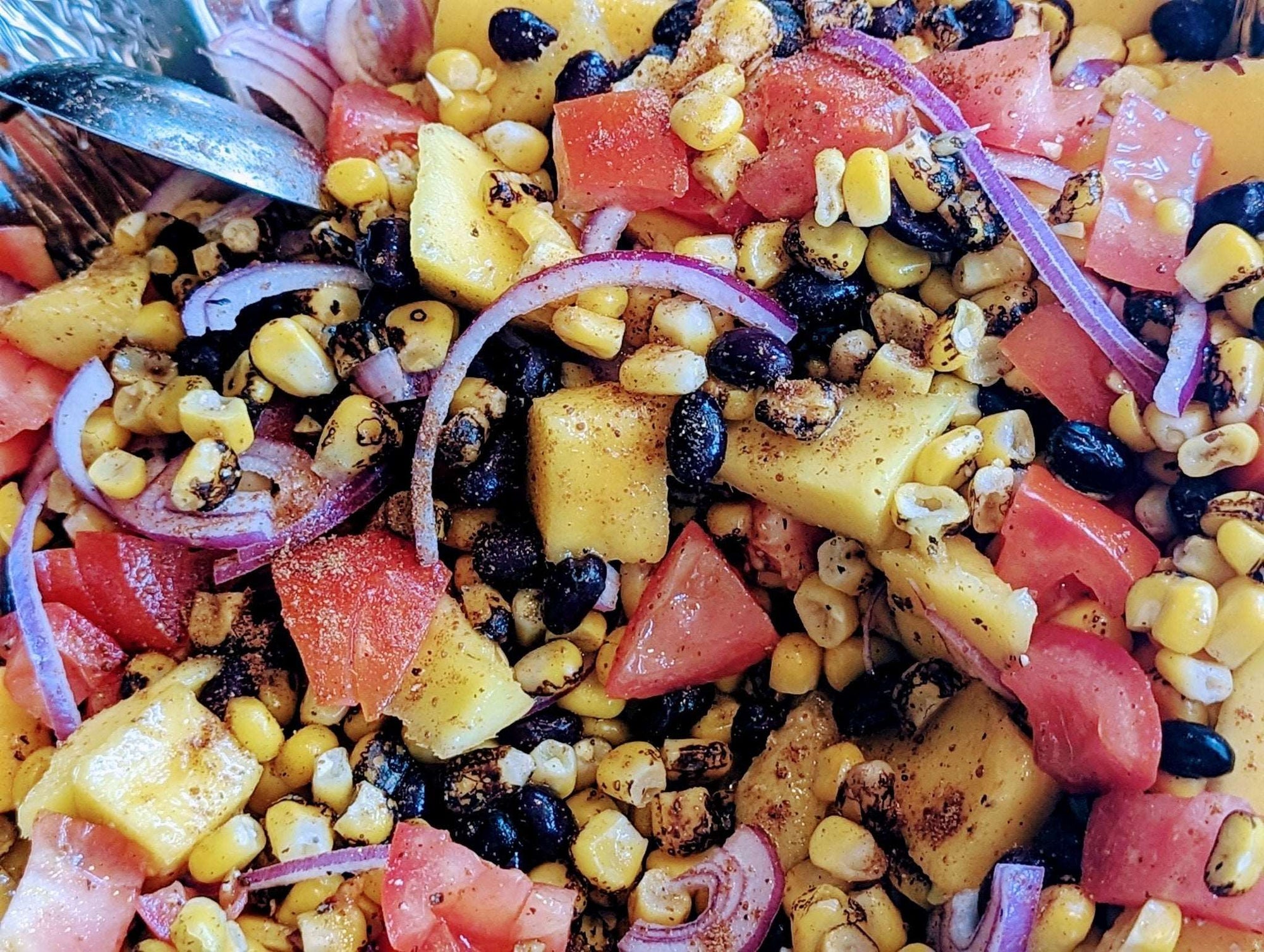 a tangy, spicy summer salad with DHOL Popcorn Spice mix