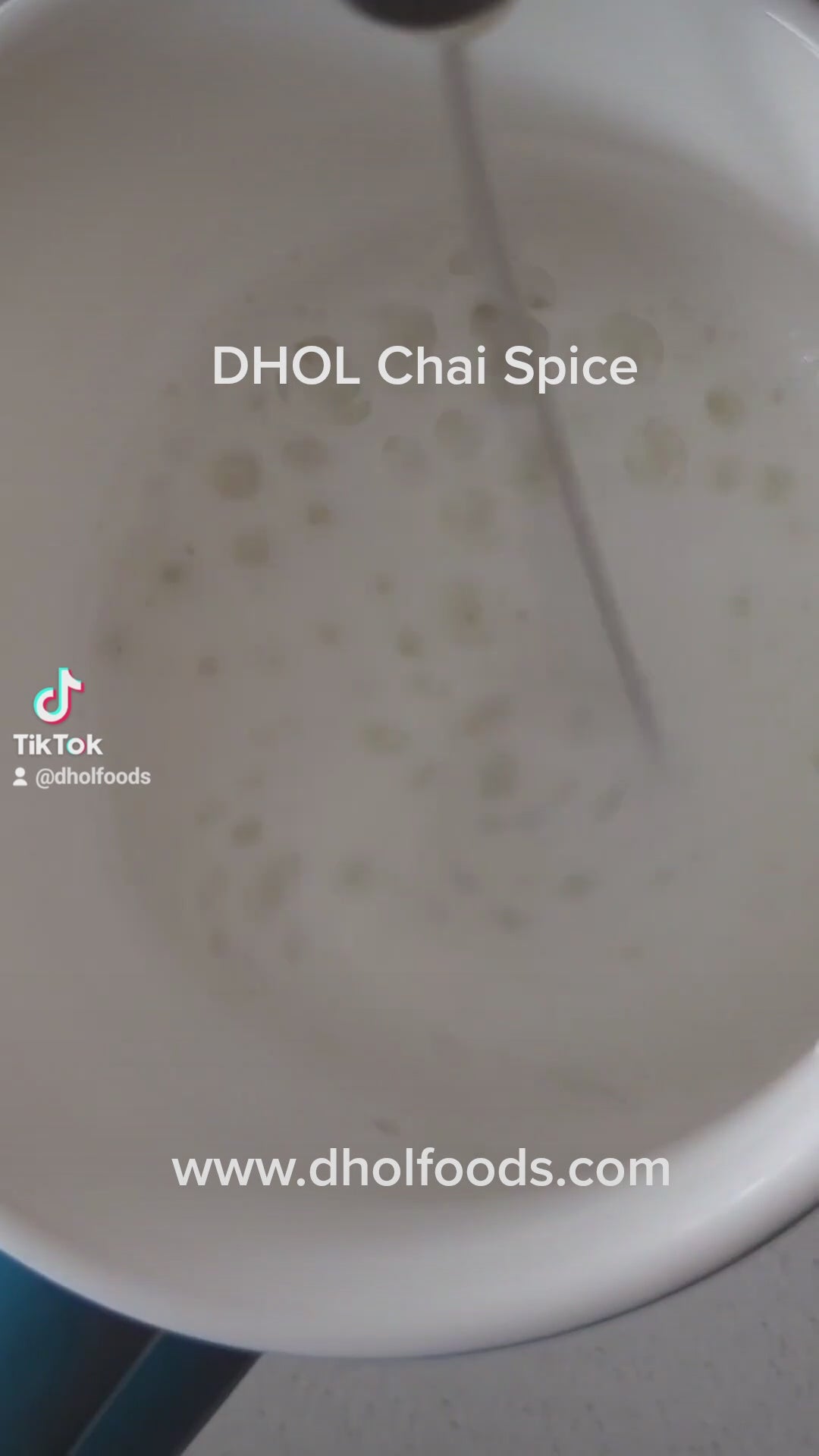 making a delicious, warm chai latte with dhol chai spice